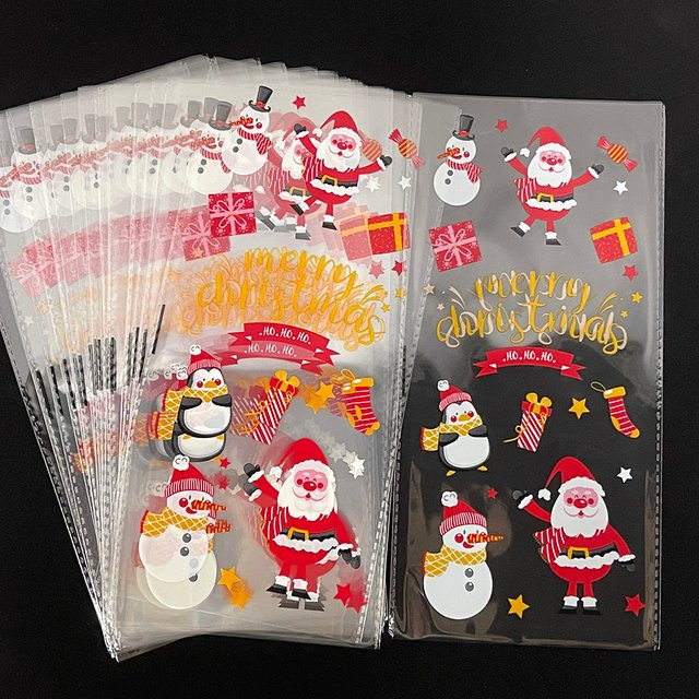 50 Stück Weihnachts-Geschenktüten aus Kunststoff mit Weihnachtsmann, Schneeflocke und Weihnachtsbaum Motiven in Mehrfarbig für Süßigkeiten und Kekse - Bild 1