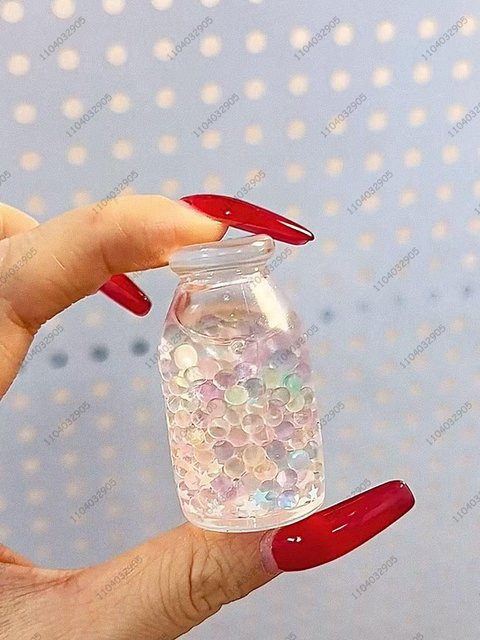 A Family Of Home Textiles Mini-Milchflasche Stressball, Quetschspielzeug, Fidget Spielzeug - Bild 1