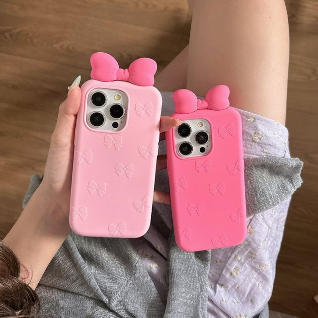 Rosa Silikon Handyhülle mit dreidimensionaler Schleife für Apple iPhone 16, 15, 14 und 13 Pro Max - Bild 1