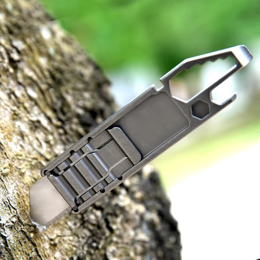 Multitool Allzweckmesser aus Titanlegierung mit 10 abnehmbaren Sk5-Stahlklingen - Bild 5