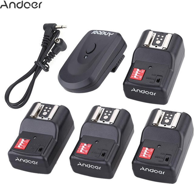 Andoer 16-Kanal Funkfernblitzauslöser-Set in Schwarz mit 1 Sender, 4 Empfängern und Synchronkabel - Bild 1