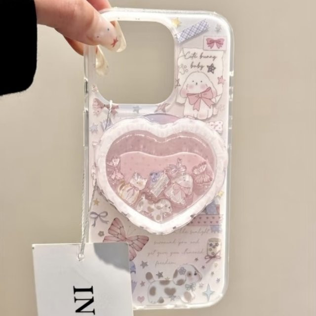 DIXSG Magnetischer Griptok Telefonständer mit Cartoon Quicksand Herz für MagSafe iPhone, Farbe: Pink - Bild 1