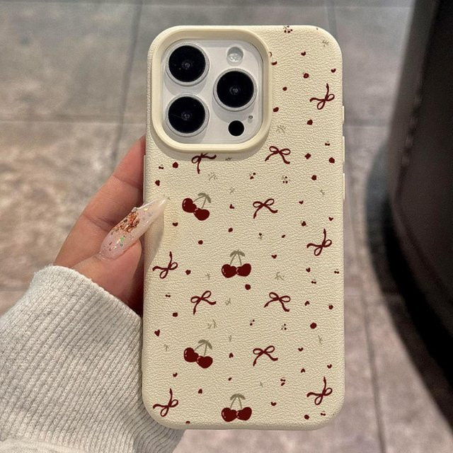 TUNEDEE Kirsch Handyhülle aus weichem Leder mit Herz und Schleife für iPhone 11 bis iPhone 16 Pro Max in Beige - Bild 1