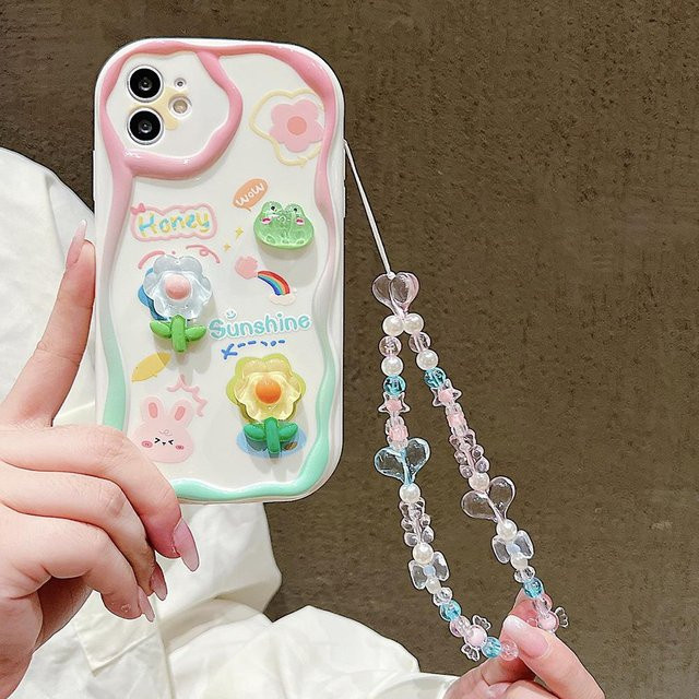 TUNEDEE Handyhülle mit 3D-Blumen und Handgelenkkette für iPhone, Transparent/Multicolor, Weiche Schutzhülle mit Lanyard - Bild 1