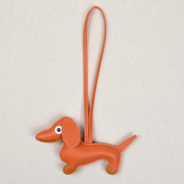 Schlüsselanhänger und Taschenanhänger Leder, Dackel, orange, Unisex - Bild 1