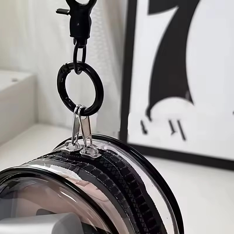 Tragbare Mini-Aufbewahrungstasche in Schwarz mit transparentem Reißverschluss und Schlüsselanhänger-Schlaufe als platzsparender Kabel-Organizer für Kopfhörer und Ladegeräte - Bild 4