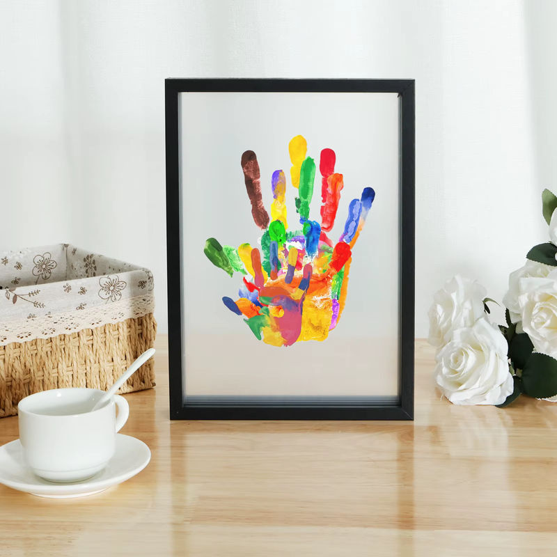 Transparentes Familien-Handabdruck-Set als DIY-Andenken für Neugeborene mit Holzrahmen, 6-Farben-Stift, Radiergummi und Pinsel in Multicolor und Weiß - Bild 2