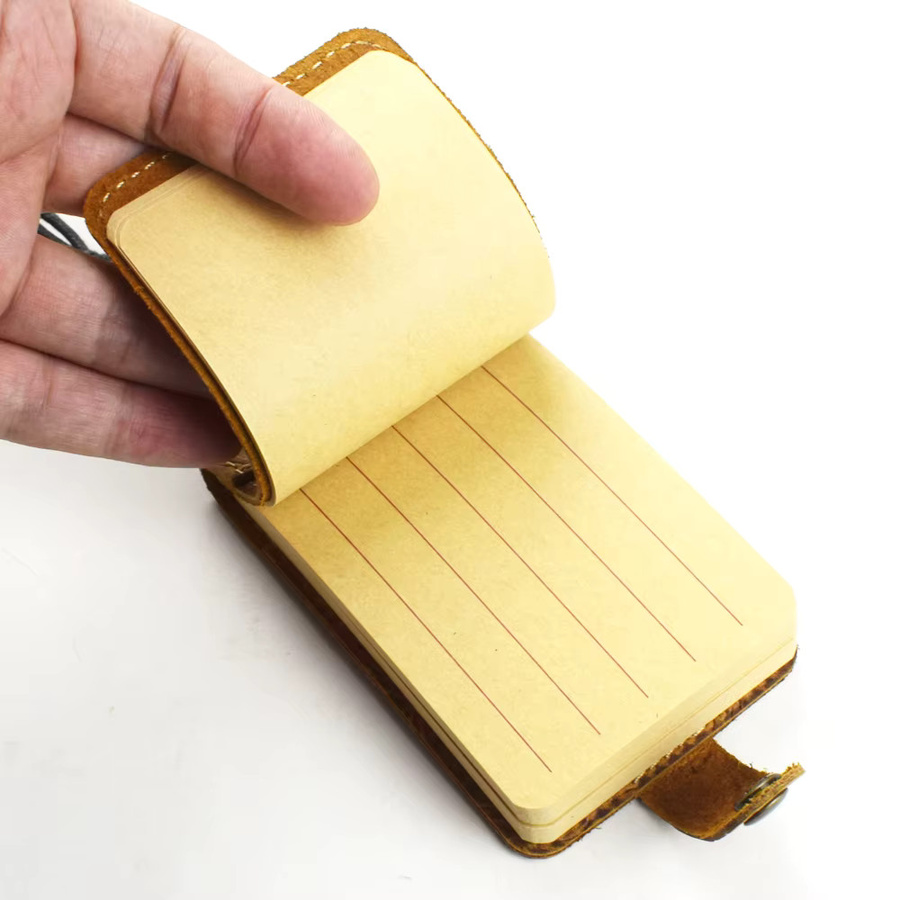 Vintage Notizblock-Organizer aus braunem Leder mit graviertem Bezug und linierten Kraftpapierseiten im Taschenformat - Bild 3