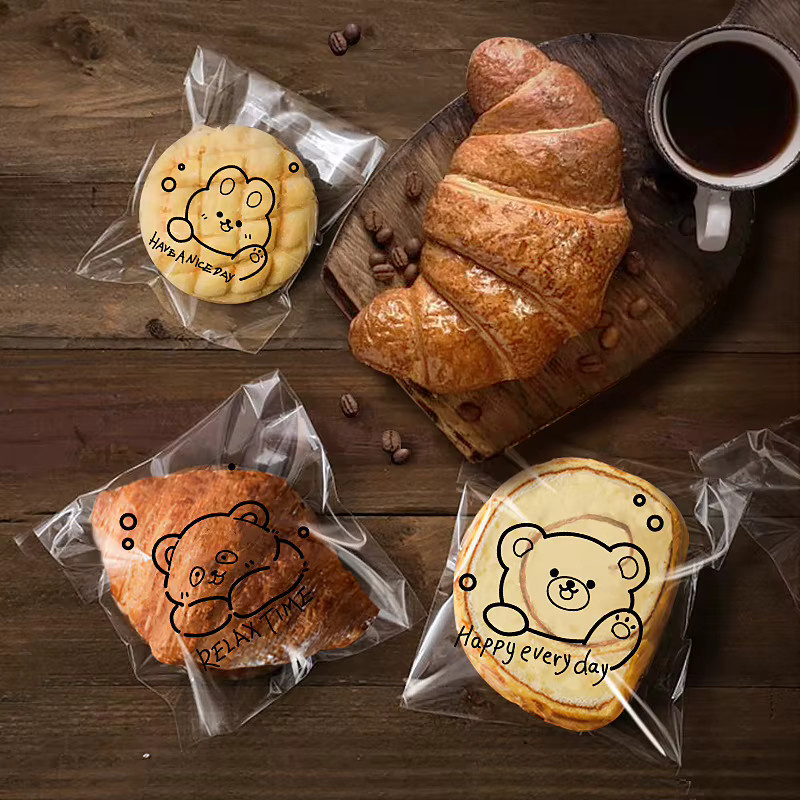 100 Stück transparente 3-in-1 Cartoon-Backbeutel aus Kunststoff für Brot, Kekse und Gebäck - Bild 2