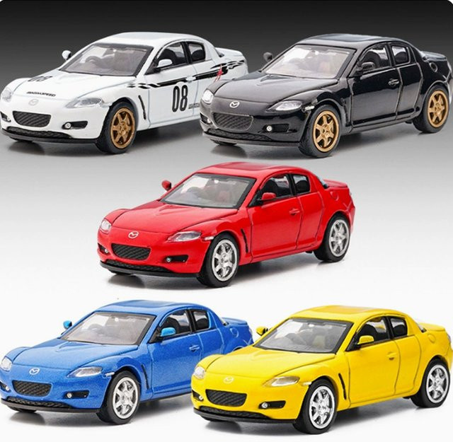 Welly RX-8 Sportwagen, Simulationsmodell, 1:64, Metall, Weiß - Bild 1