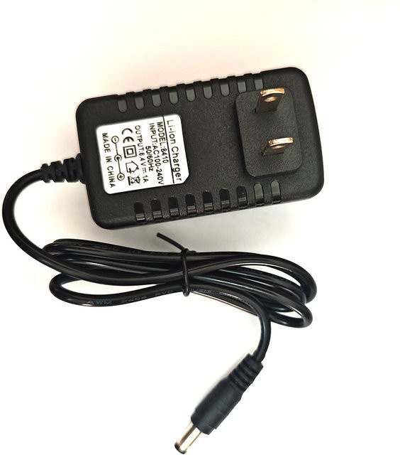 Deexintom Lithium-Ionen-Akku-Ladegerät 8,4V in Schwarz mit 5,5 x 2,1 mm Barrel Plug - Bild 1
