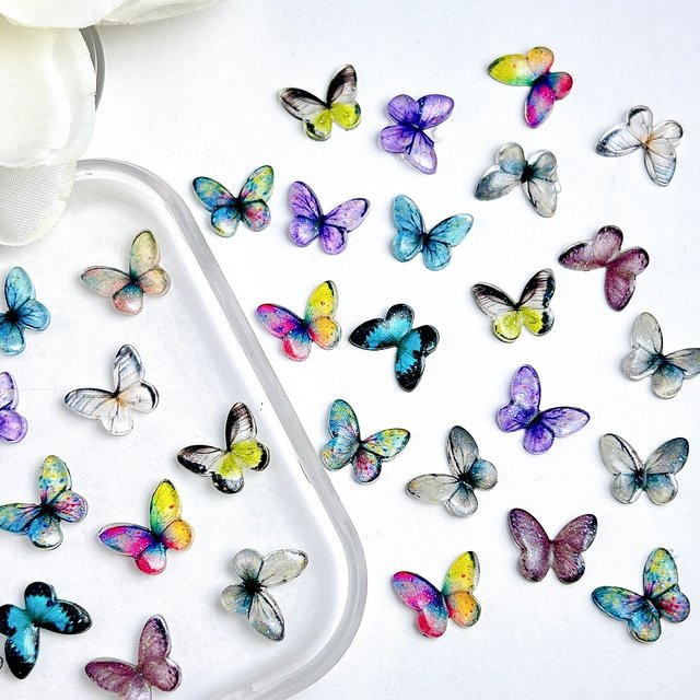 20 Stück Schimmernde Resin Butterfly Nail Art Decorations, Bunt - Bild 1
