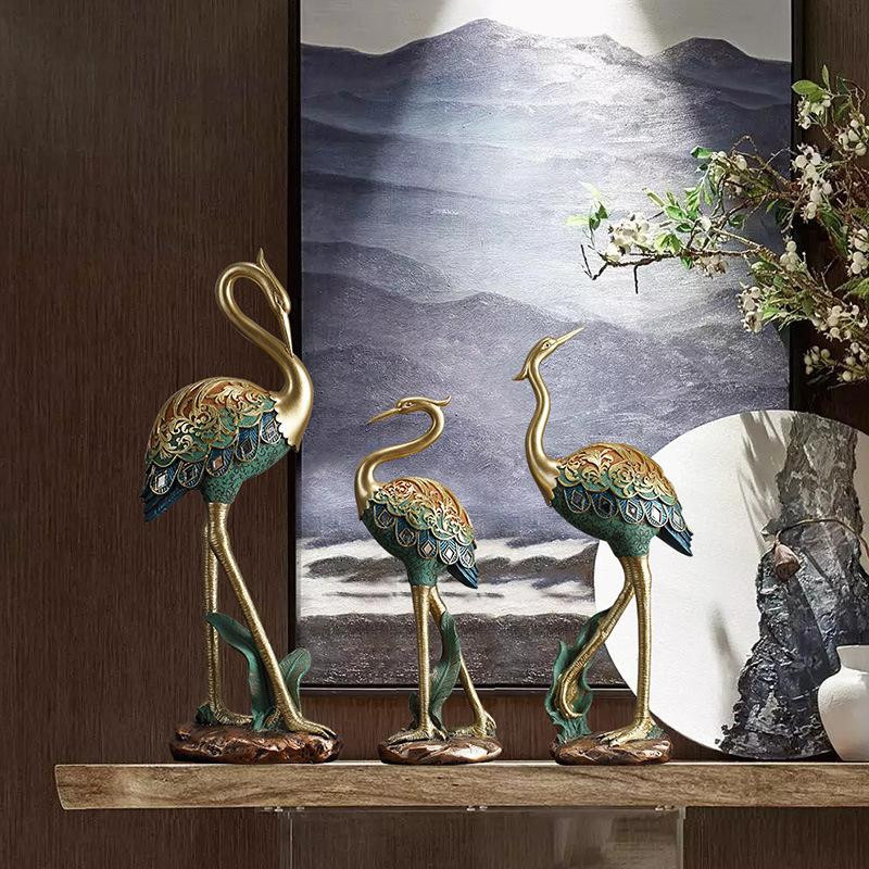 Yiran Furniture Bemalter Kran aus Harz als dekorative Figur in Gold für dein Zuhause - Bild 2