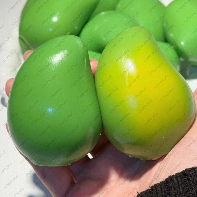 Binchi Mango Stressball Squishy, Farbwechselnd, Fidget Spielzeug - Bild 1