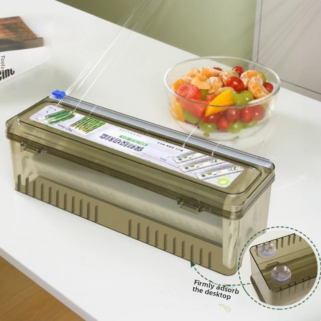 Transparenter Lebensmittelrollen-Spender aus Kunststoff mit integriertem Schneidelement zur Aufbewahrung und zum Schneiden von Frischhaltefolie oder Aluminiumfolie - Bild 1