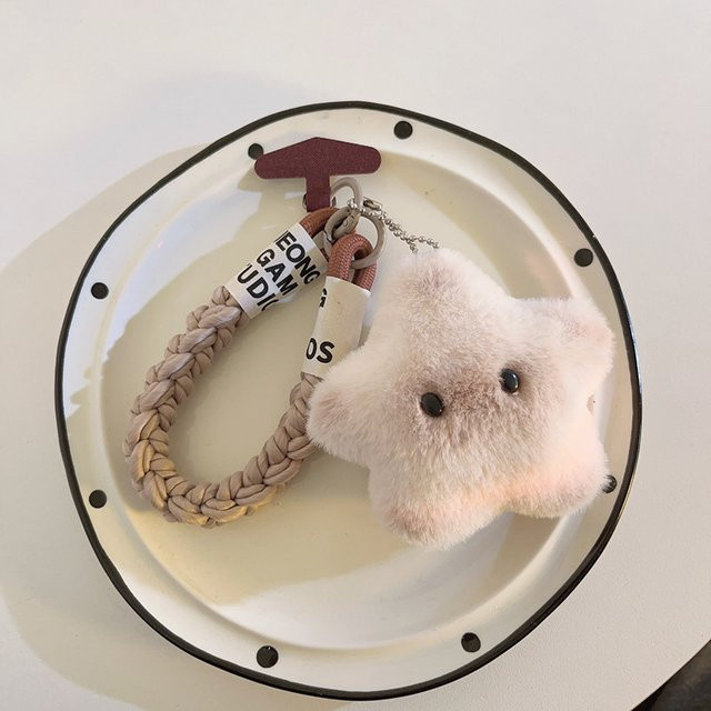 Stern-Schlüsselanhänger mit niedlichem Gesicht als Plüsch-Schlüsselanhänger und Handygurt in Beige - Bild 1