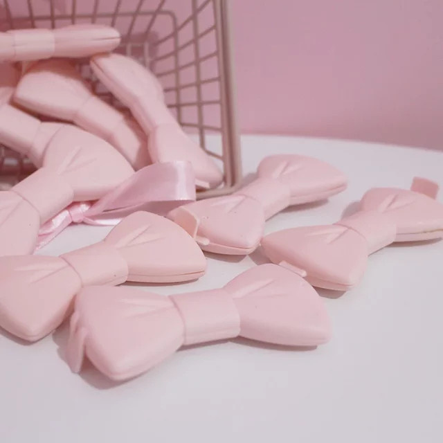 4 Stück Verschlussbeutel-Clips in Pink aus Kunststoff mit Schleifenknoten-Design zur Lebensmittelaufbewahrung - Bild 1