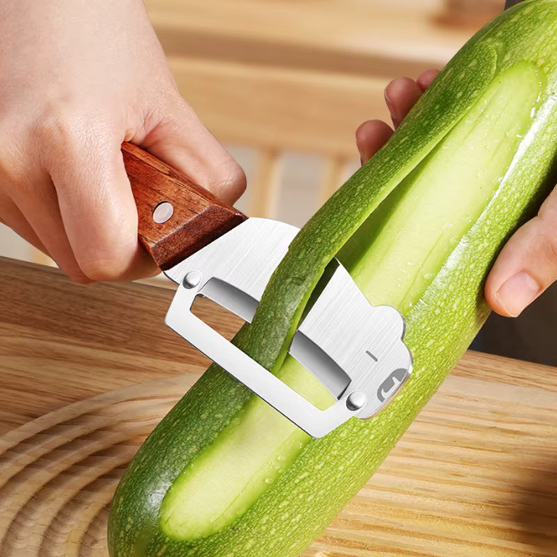 Multifunktionaler WXCOO Küchenschäler mit Holzgriff in Braun für Obst, Gemüse und Kürbis - Bild 4