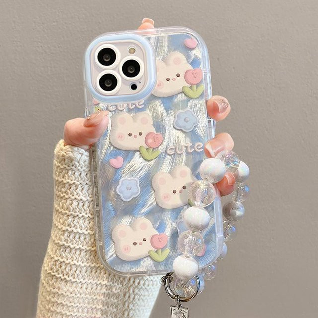 Handyhülle mit Kaninchen und Blumen für Apple iPhone 16, 15 Pro, 14 Pro Max, 13, 12 in Multicolour - Bild 1