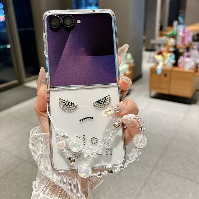 Stoßfeste Samsung Galaxy Z Flip Handyhülle mit Strass-Gesichtern und Handgelenkschlaufe, Transparent - Bild 1