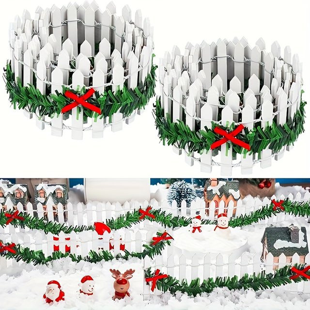 DUTRIEUX Mini Weihnachtsdorf Dekoration Weißer Lattenzaun mit Holzoptik, Grüner Girlande und Roten Schleifen für Puppenhaus und Gartendekoration - Bild 1