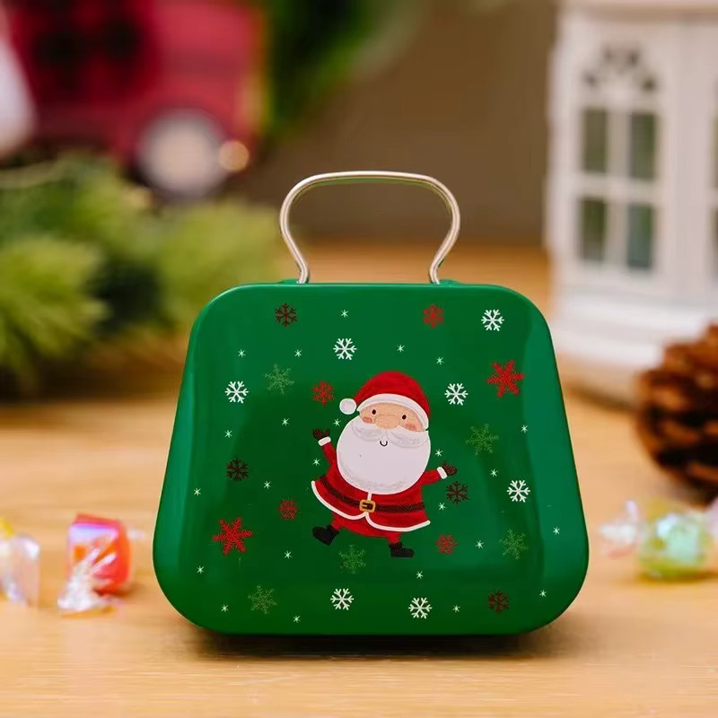 Dekorative Weihnachts-Geschenkbox in Form einer grünen Blechhandtasche für Partygeschenke und Tischdekoration - Bild 1