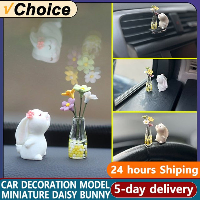 Miniatur Kaninchen mit Gänseblümchen als Auto Ornament aus Kunstharz in Weiß - Bild 1