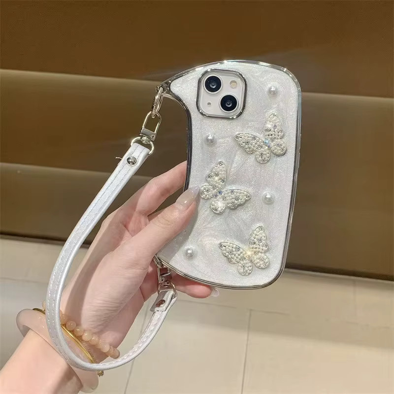 MUQGEW Handyhülle mit 3D-Glitzer-Perlen und Schmetterlings-Design für iPhone, inklusive Lederband und stoßfestem Schutz, Farbe: Weiß - Bild 2