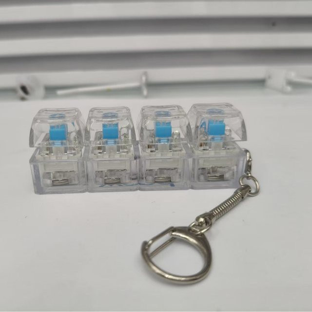 ZAKOL Schlüsselanhänger LED-Dekompressions-Tastatur, transparent, Unisex - Bild 1