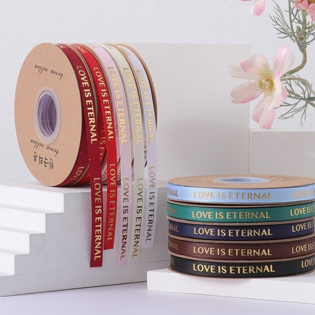 Dekoratives Bronzing Band Liebe ist ewig in Gold und Rot für Geschenke und Backzubehör - Bild 1