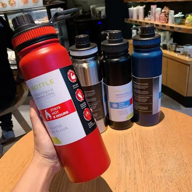 Outdoor Thermos Wasserflasche mit Tee-Filter aus 304 Edelstahl in Schwarz oder Rot, 600 ml, 800 ml oder 1000 ml - Bild 1