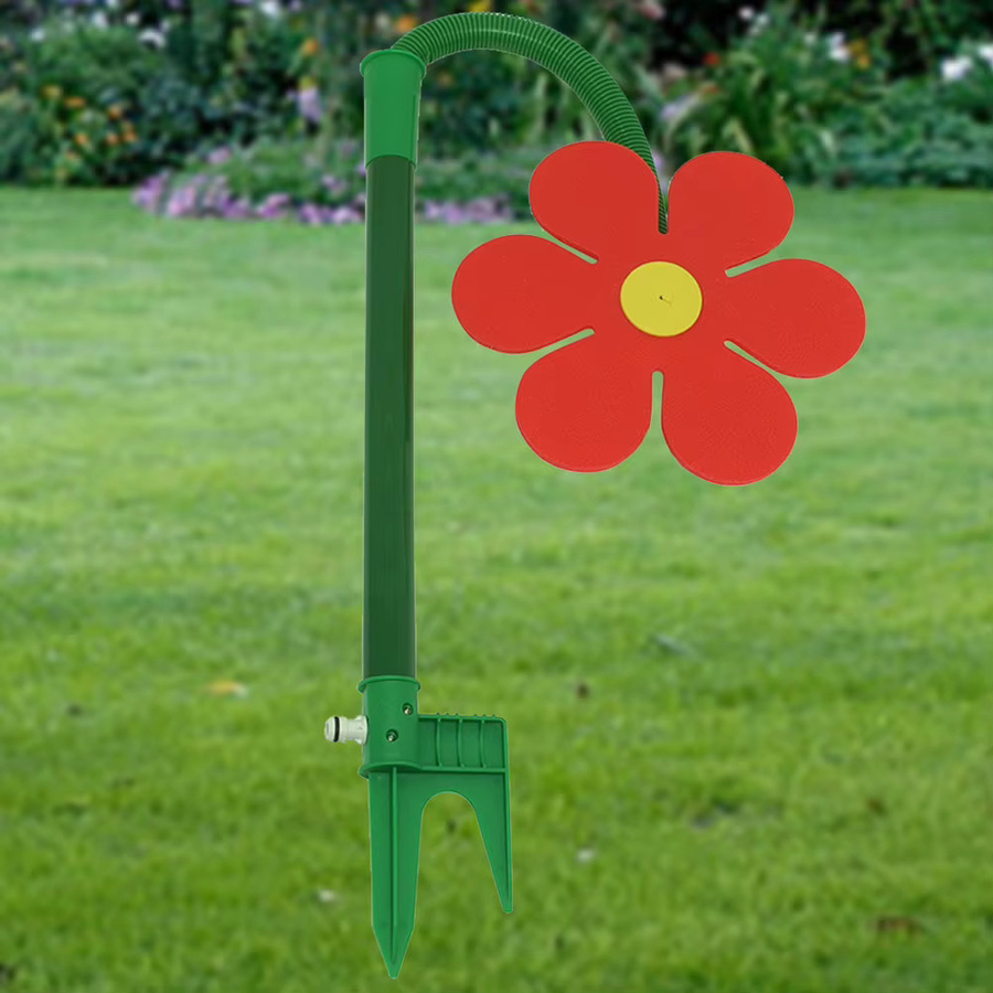 Rotierender Rasensprinkler in Blumenform mit Gänseblümchen-Design in Rot und Gelb zur Gartenbewässerung - Bild 1