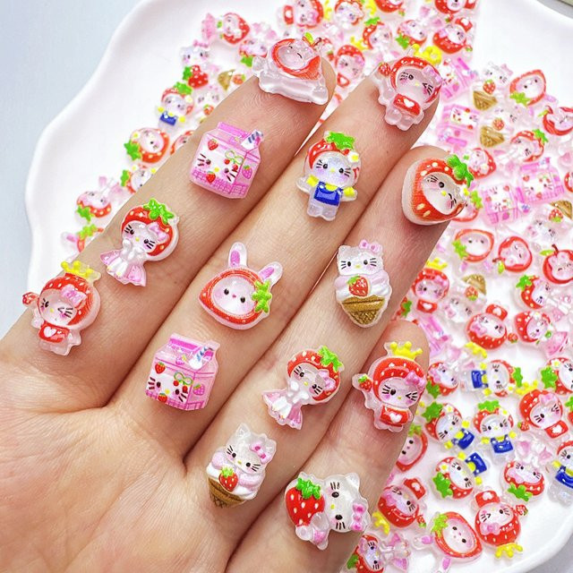 KT Kitty Erdbeer-Nagelcharms, 100 Stück, Glänzend, Unisex - Bild 1