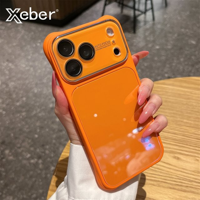 Xeber Silikon-Glas-Handyhülle mit hartem Rückteil für iPhone 17 Pro Max und 16 Pro in Gelb und Orange - Bild 1