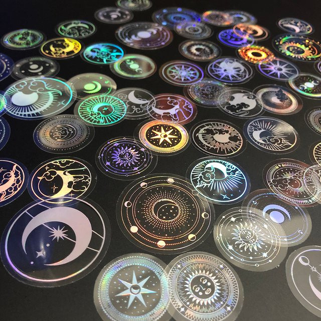 70 Stück transparente PET-Klebeetiketten in Silber mit Motiven wie Sonne, Mond und Sternen, wasserdicht und lasergeschnitten - Bild 1