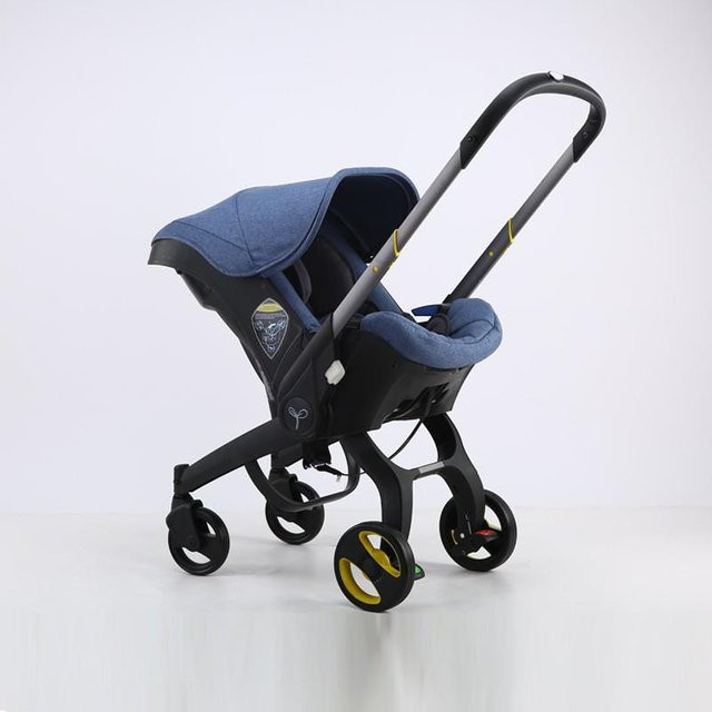 Multifunktionale Babywiege und Kinderwagen von BabyBloom Shop in Denim-Blau mit faltbarem und drehbarem Sitz für 0-12 Monate - Bild 1