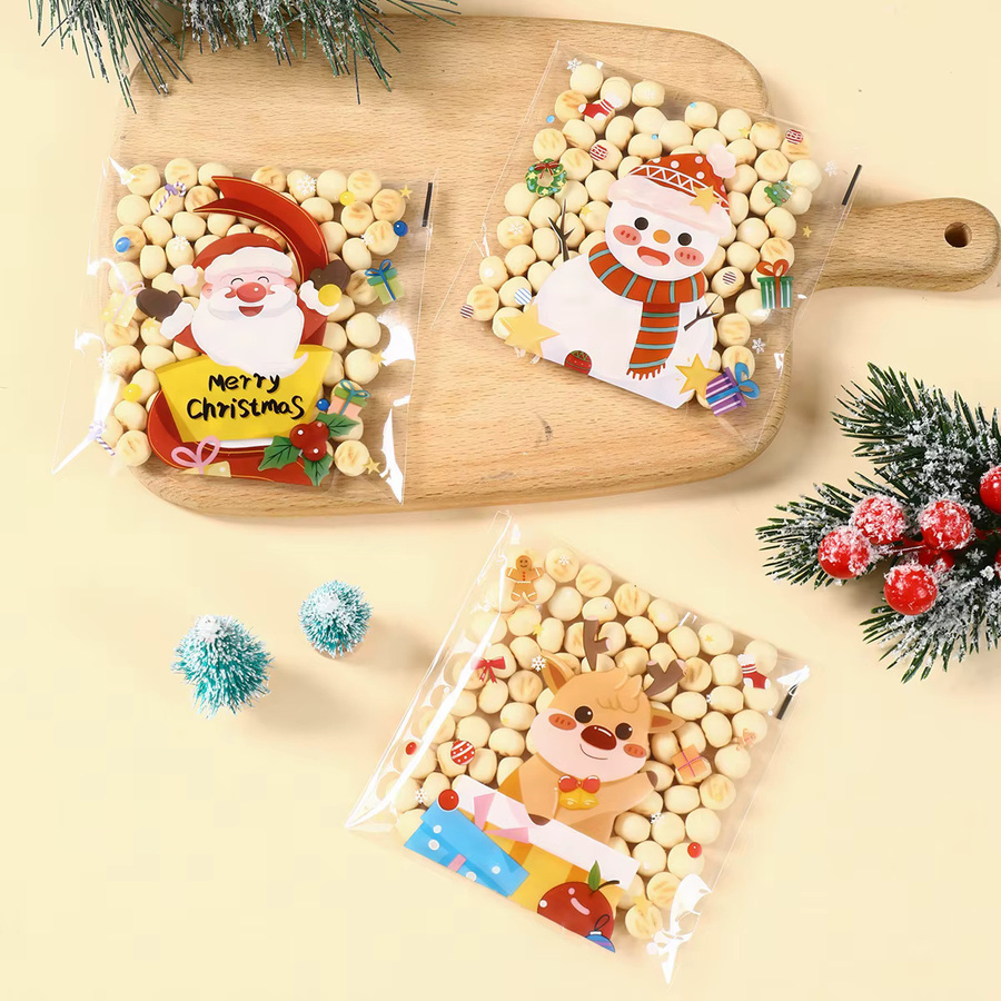 PATIMATE Weihnachts-Süßigkeitstüten mit Weihnachtsmann-Motiv, transparente selbstklebende Kunststoffbeutel für Kekse und Geschenke - Bild 1