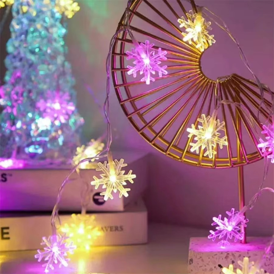 Rosa LED Schneeflocken-Lichterkette mit warmweißem Licht für Dekoration zu Hochzeit, Party und Winterfesten - Bild 2
