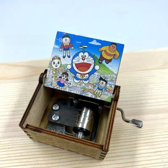 Bandai Doraemon-Spieluhr aus Holz, mit Handkurbel, geschnitzt, UV-bemalt - Bild 1