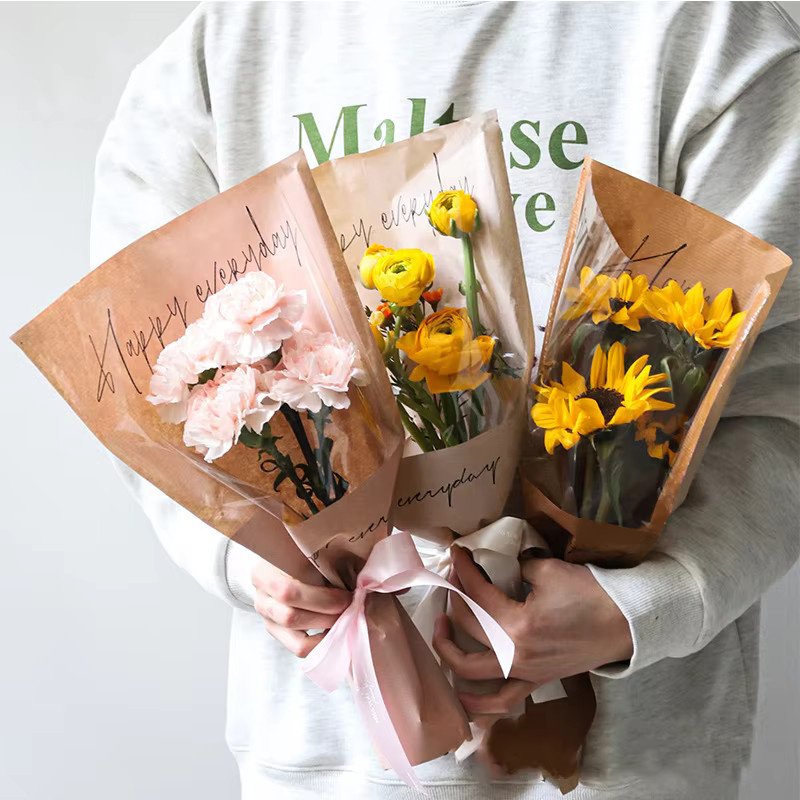 Durchsichtige Blumenverpackungsbeutel aus Kunststoff mit einzelnen Rosenärmeln in Pink für deinen Blumenstrauß zum Valentinstag - Bild 2