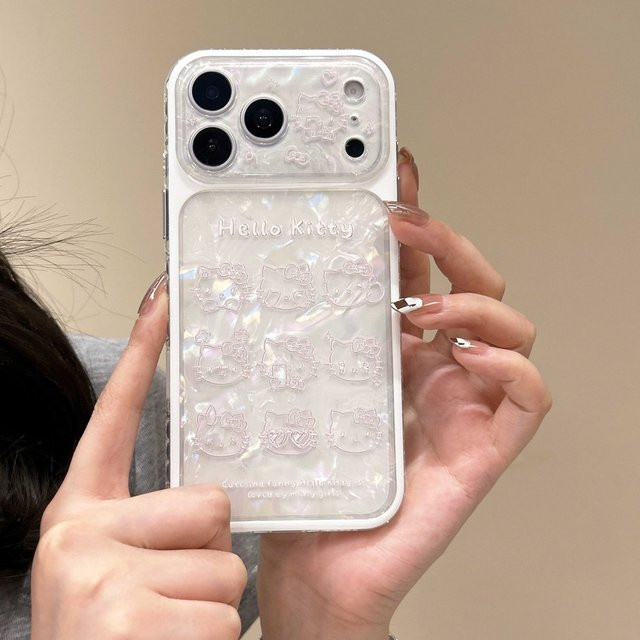 Sanrio Hello Kitty Handyhülle mit Muschelmuster und Linsenschutz in Silber für iPhone 17 16 15 Pro Max - Bild 1