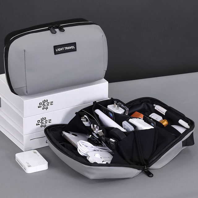 Enyawell Tragbare Kabel-Organizer-Tasche als All-in-One-Aufbewahrungstasche für Kabel, Ladegeräte und Gadgets in Schwarz und Grau - Bild 1