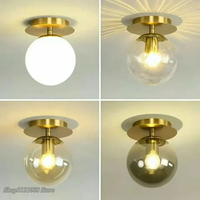 Moderne LED Deckenleuchte LZPZ RUI aus Glas und Metall in Gold/Messing mit transparentem Kugelschirm - Bild 1