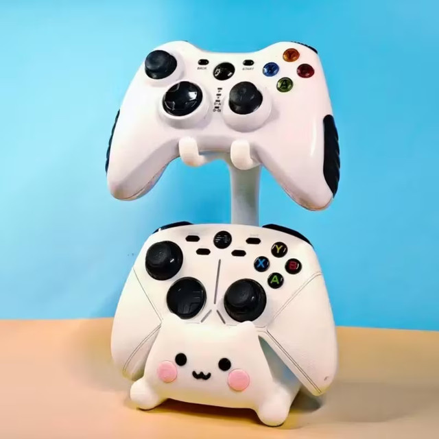 Katzenförmiger Spielständer in Weiß für PS5, PS4, Xbox und Nintendo Switch aus robustem Kunststoff - Bild 1