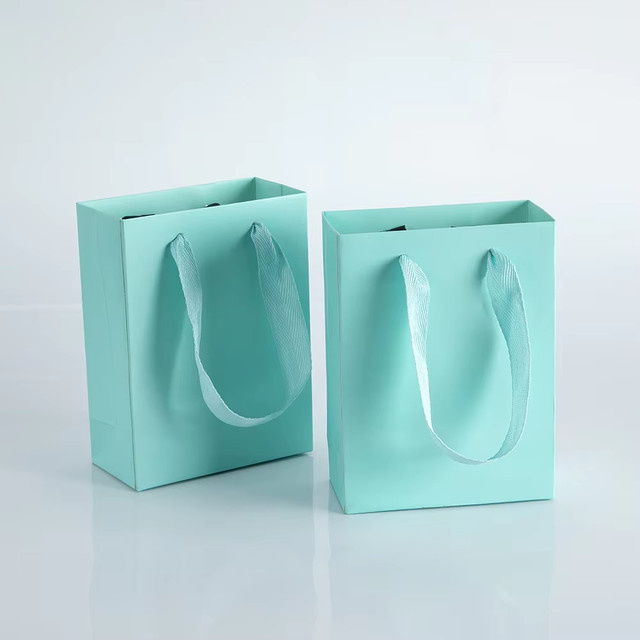 10er-Pack Kraftpapier-Geschenktüten mit Griffen in Türkis für Schmuck und Geschenke - Bild 1
