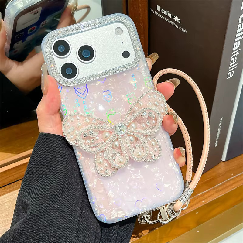 MUQGEW Luxuriöse iPhone Handyhülle mit Laser-Herz-Shell-Muster und vergoldetem Diamant-Schmetterlings-Design in Gold, stoßfeste Schutzhülle für iPhone 17, 16, 15, 14, 13 Pro Max - Bild 2