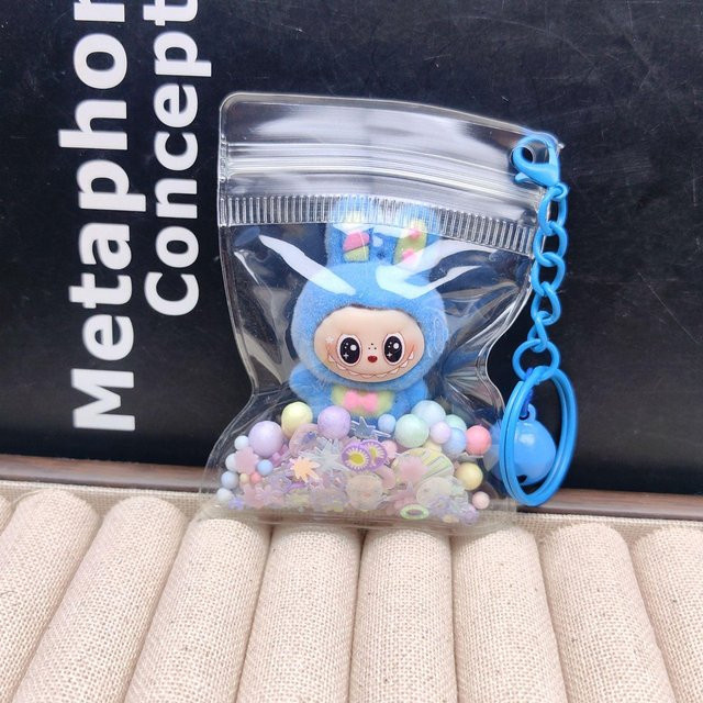 Schlüsselanhänger Puppe, PVC, Transparent, Unisex - Bild 1