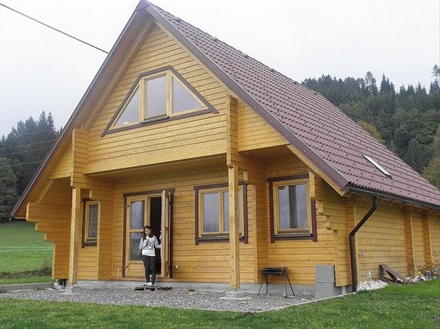 Holzhaus Ferienhaus Blockhaus von Holzhaus Ferienhäuser mit 94mm Wandstärke, B/T: 8,8 x 7,8 m - Bild 1
