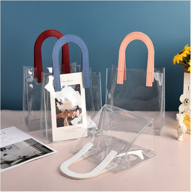 Flexible transparente Einkaufstasche aus PVC mit U-Form Griff in Pink - Bild 1