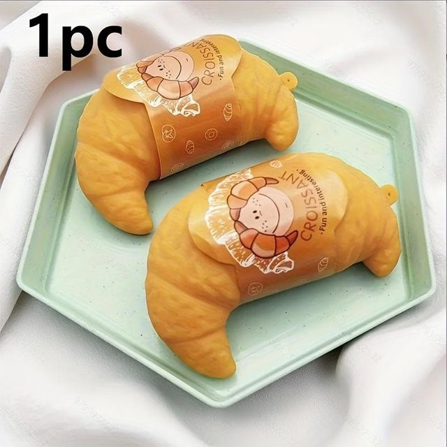 Topmix Croissant Squishy Spielzeug, licht grau, 1-teiliges Set - Bild 1